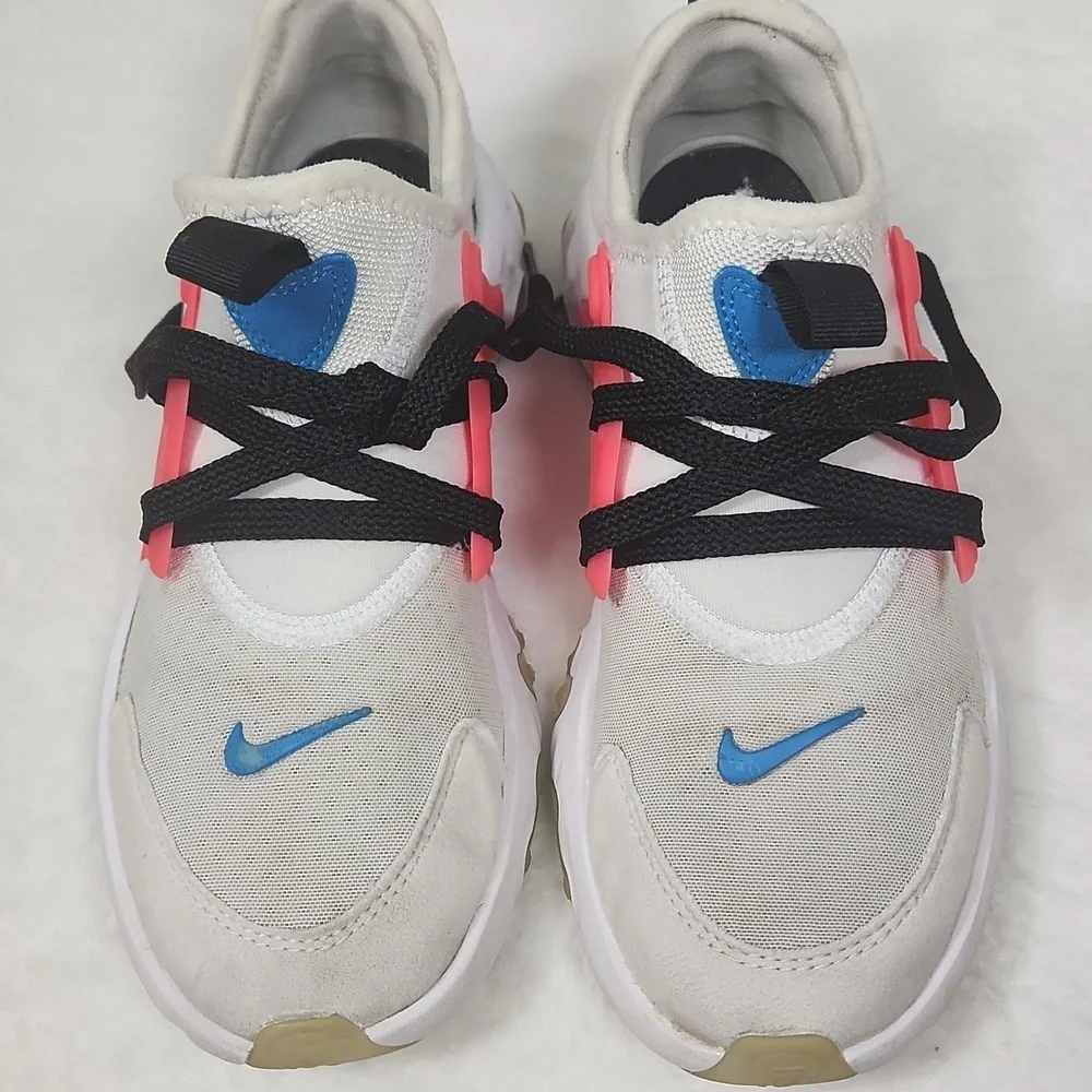 Nike Kids White and Pink Sneakers with Blue Details